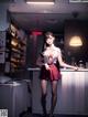 A woman in a school uniform standing in front of a counter.